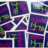 photo of custom temporary tattoos, size 2 x 2, with the words "Make Art"