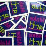 photo of custom temporary tattoos, size 2 x 2, with the words "Make Art"